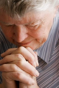 Senior woman praying