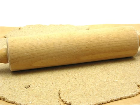 Wholemeal dough rolled out with a rolling pin