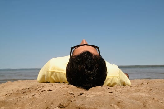 Young man on beach