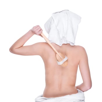 Young woman with back brush