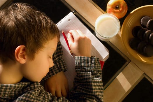 Student falls asleep on his notebook