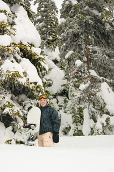 Portrait of a snowboarder in the snow