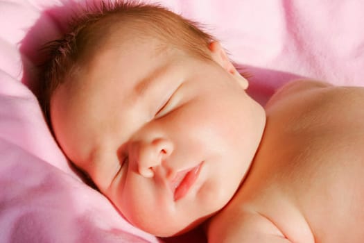 The face of a sleeping baby