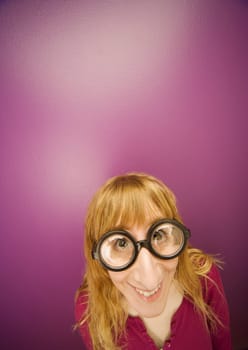 Woman wearing prop eyeglasses
