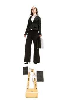 Businesswoman standing behind a starting block