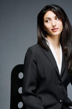Businesswoman sitting on a chair