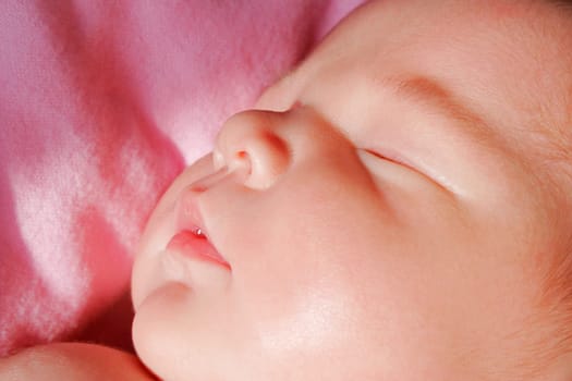 The face of a sleeping baby