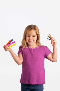 Girl with crayons and markers