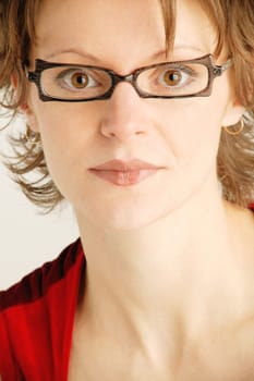 Portrait of woman with black framed glasses