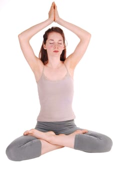 Young woman doing yoga.