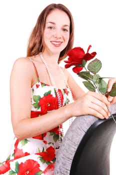 Pretty girl in dress with rose.
