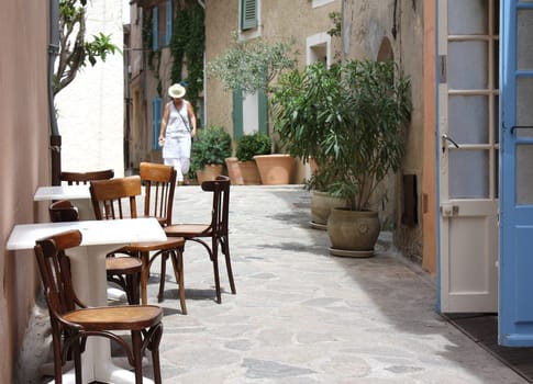 Table and chairs in front of a restaurant