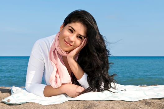 Young native american woman at beach