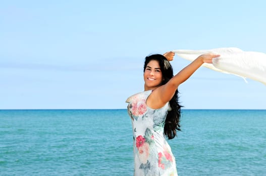 Beautiful young woman at beach