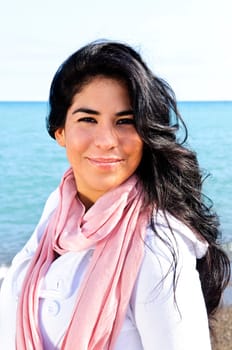 Beautiful young woman at beach