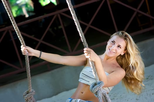 Lady on swings