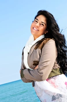 Beautiful young woman at beach