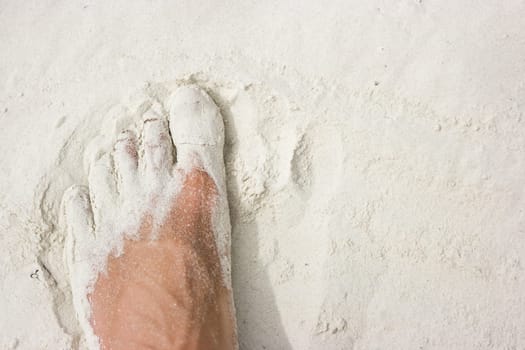 Feet in sand