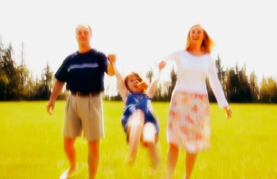 Parents play with child
