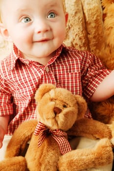 Baby with a teddy bear