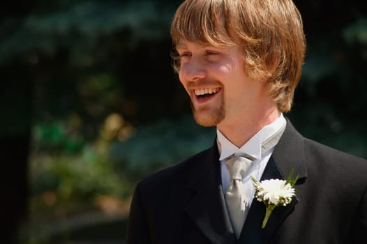 Groom smiles