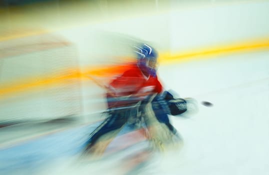 Ice hockey goalie making save