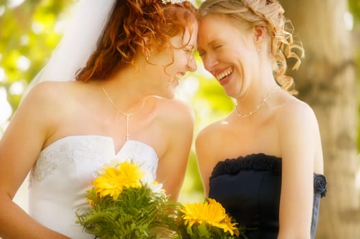 Bride and bridesmaid share memories