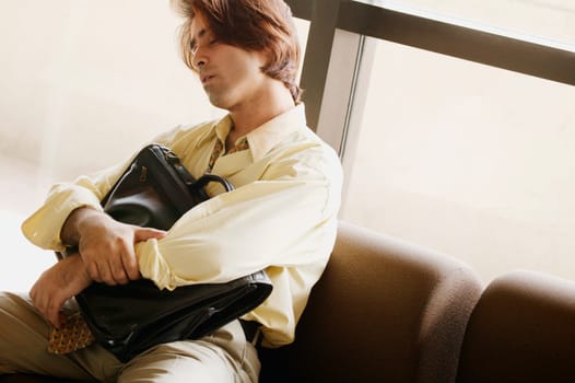 Man sleeps in airport