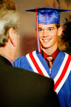 Graduate receiving diploma