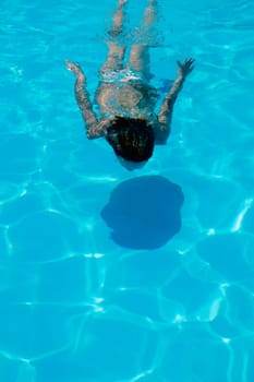 Woman swims underwater