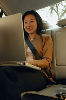 Woman works on lap top
