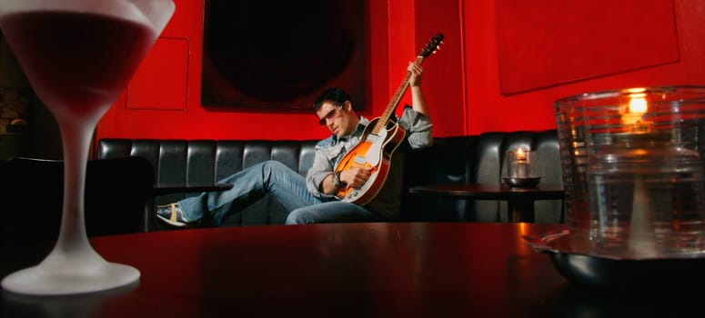 Teenager with guitar