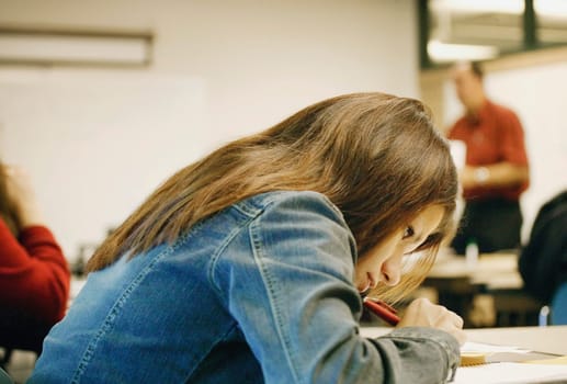 Girl works on homework