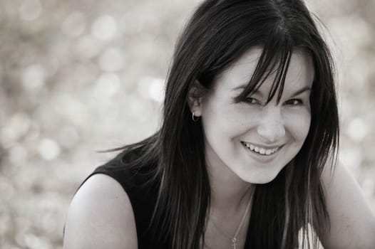 A woman smiles