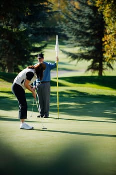 Couple go golfing