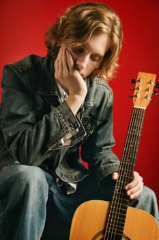 Man sitting with guitar
