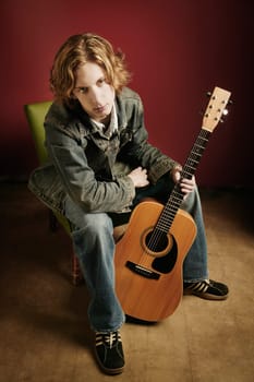 Teenager with guitar