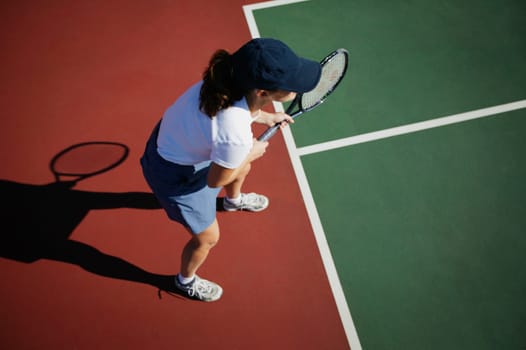 Woman plays tennis