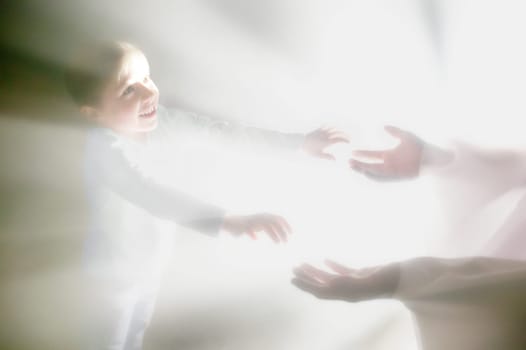 Boy reaches out for Jesus' hands