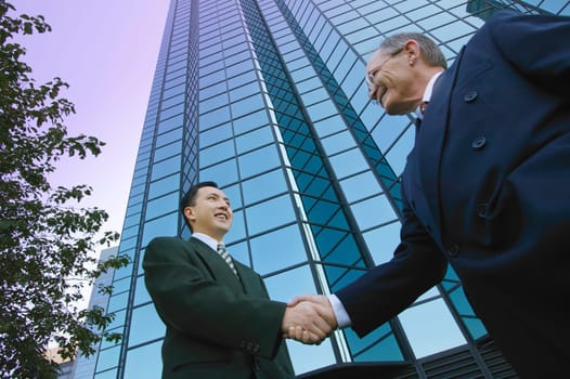 Businessmen shake hands