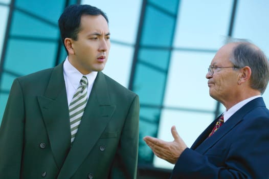 Businessmen have a discussion