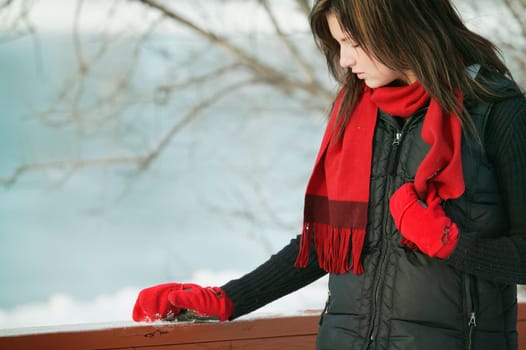 Woman with red mittens