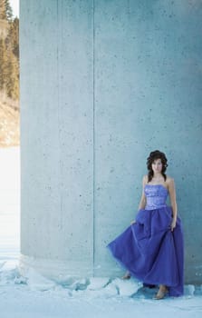 A woman with a blue gown