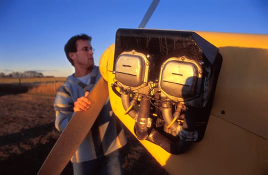 A pilot with his airplane