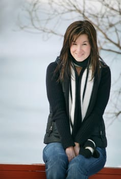 Woman sits outside