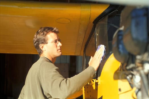 Pilot with his airplane