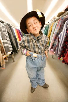 Child tries on clothes
