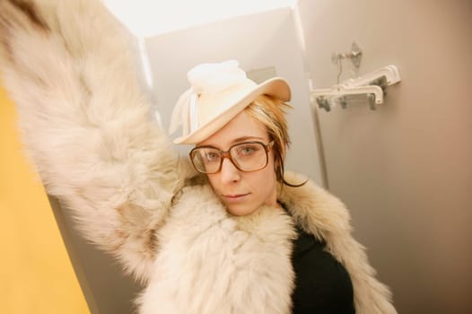 Woman tries on a fur coat