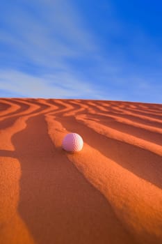 Golf Ball on Sand Dune Great Sand hills Sceptre Saskatchewan Canada