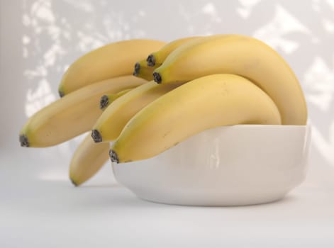 bananas in a white bowl